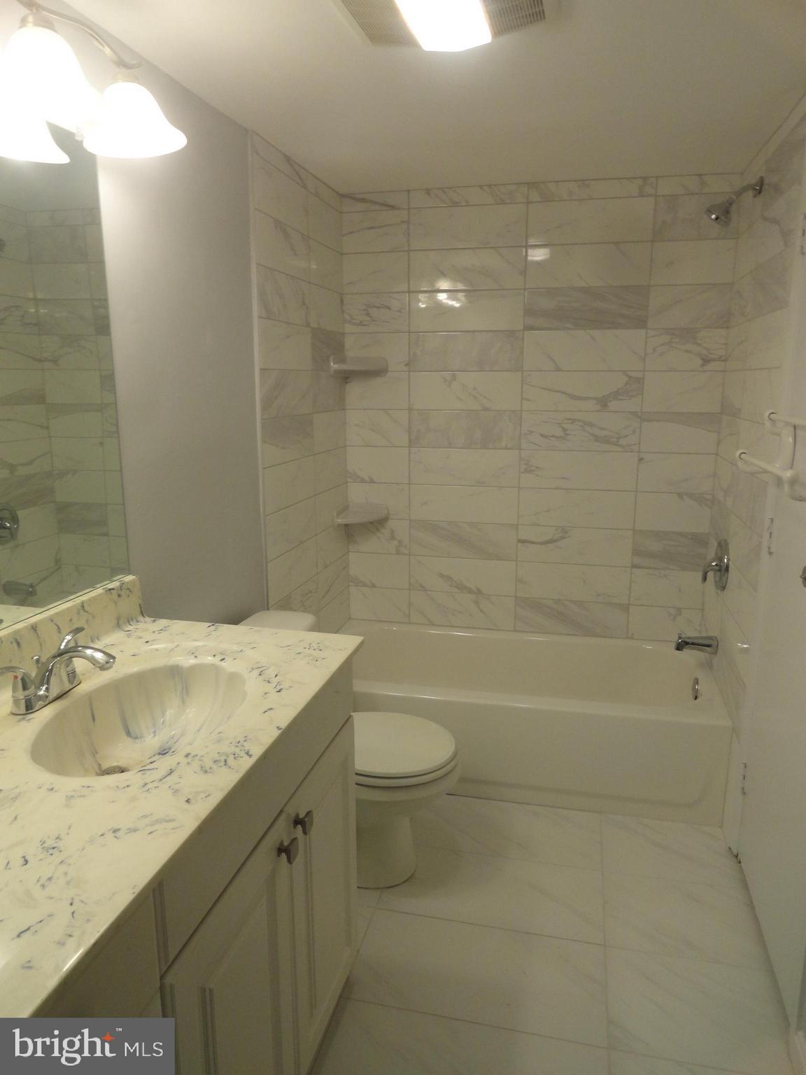 5804 Royal Ridge Drive, Unit K Springfield, VA 22152 - Photo 19 of 33 Full bathroom with new ceramic tile wall