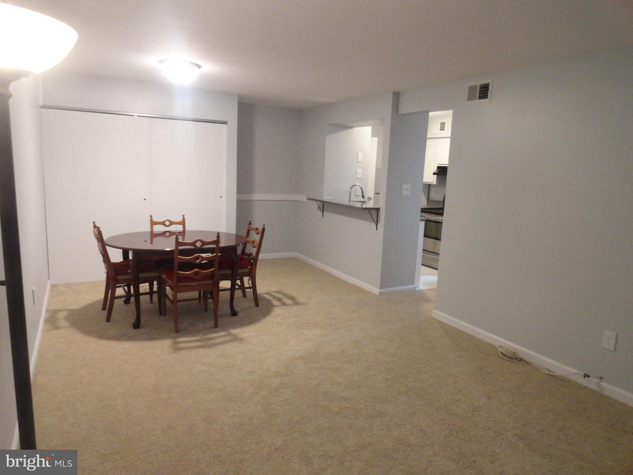 5804 Royal Ridge Drive, Unit K Springfield, VA 22152 - Photo 3 of 33 Living room and dining room