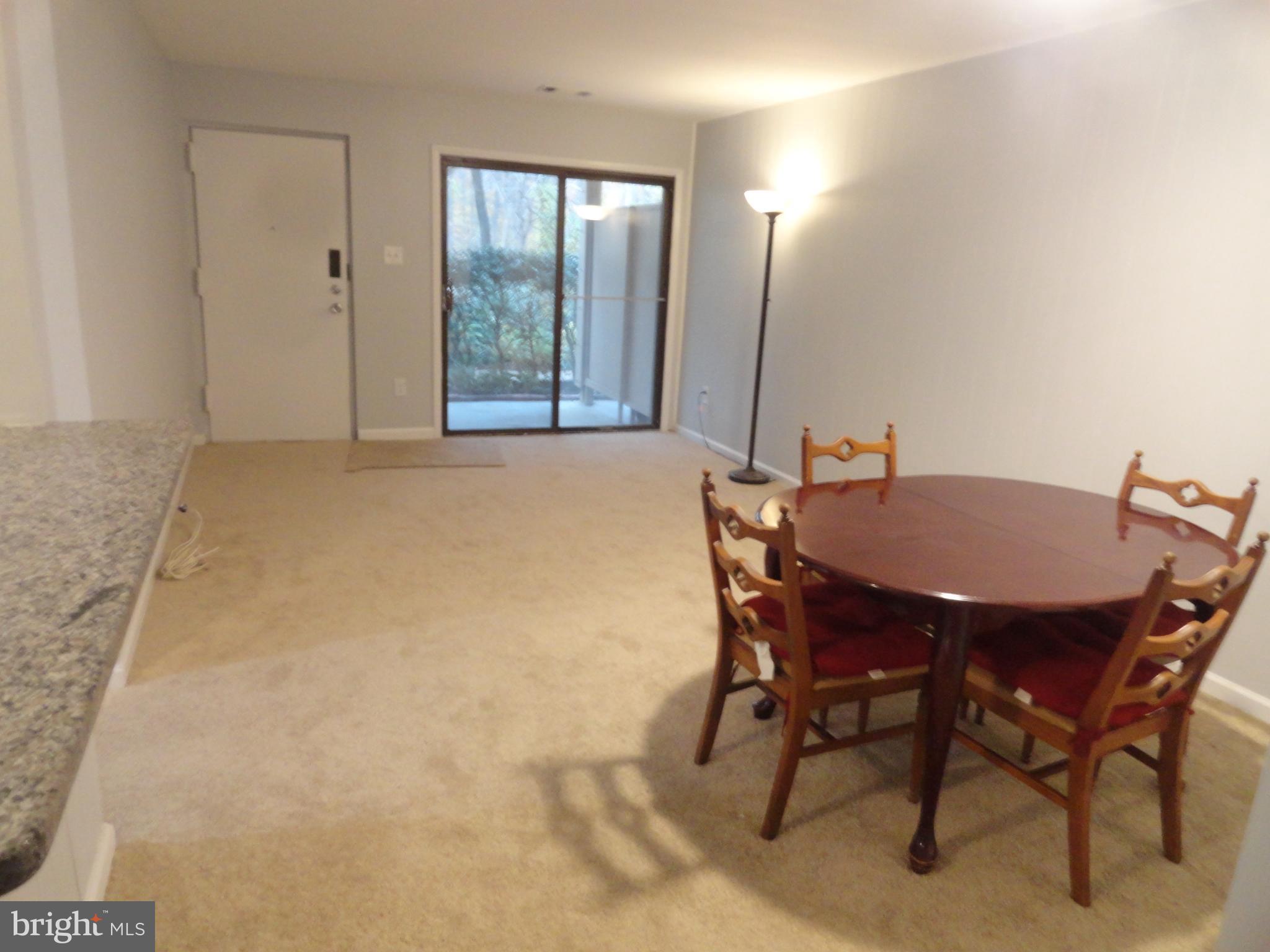 5804 Royal Ridge Drive, Unit K Springfield, VA 22152 - Photo 4 of 33 Living room and dining room view