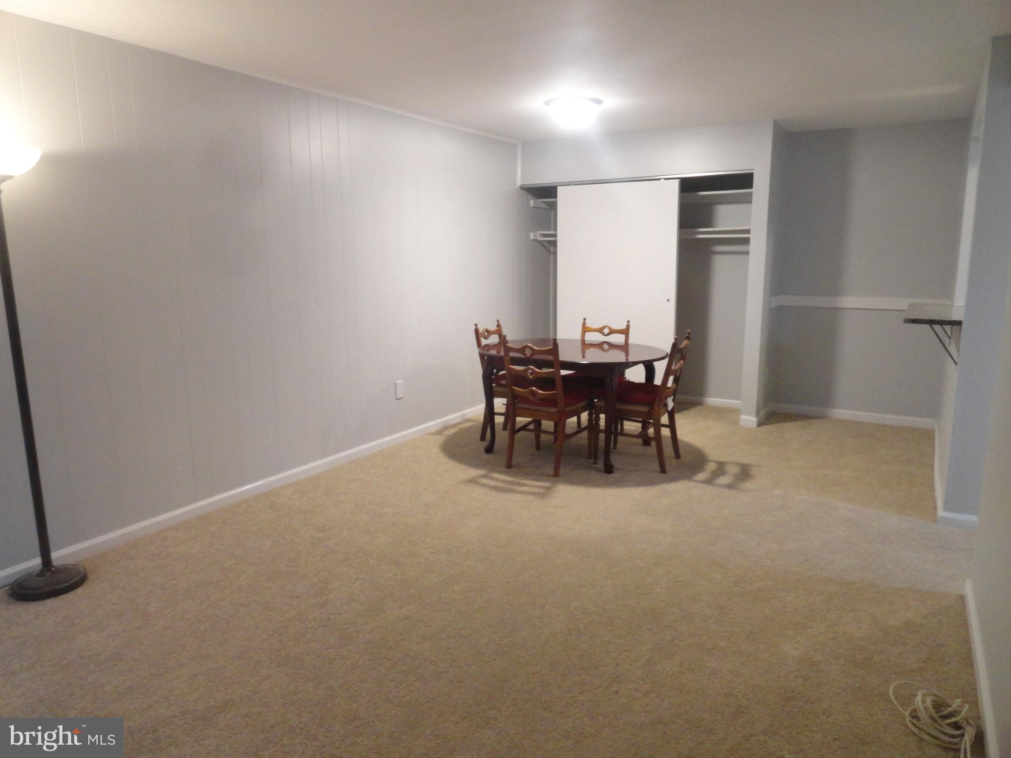 5804 Royal Ridge Drive, Unit K Springfield, VA 22152 - Photo 5 of 33 Living room and dining room