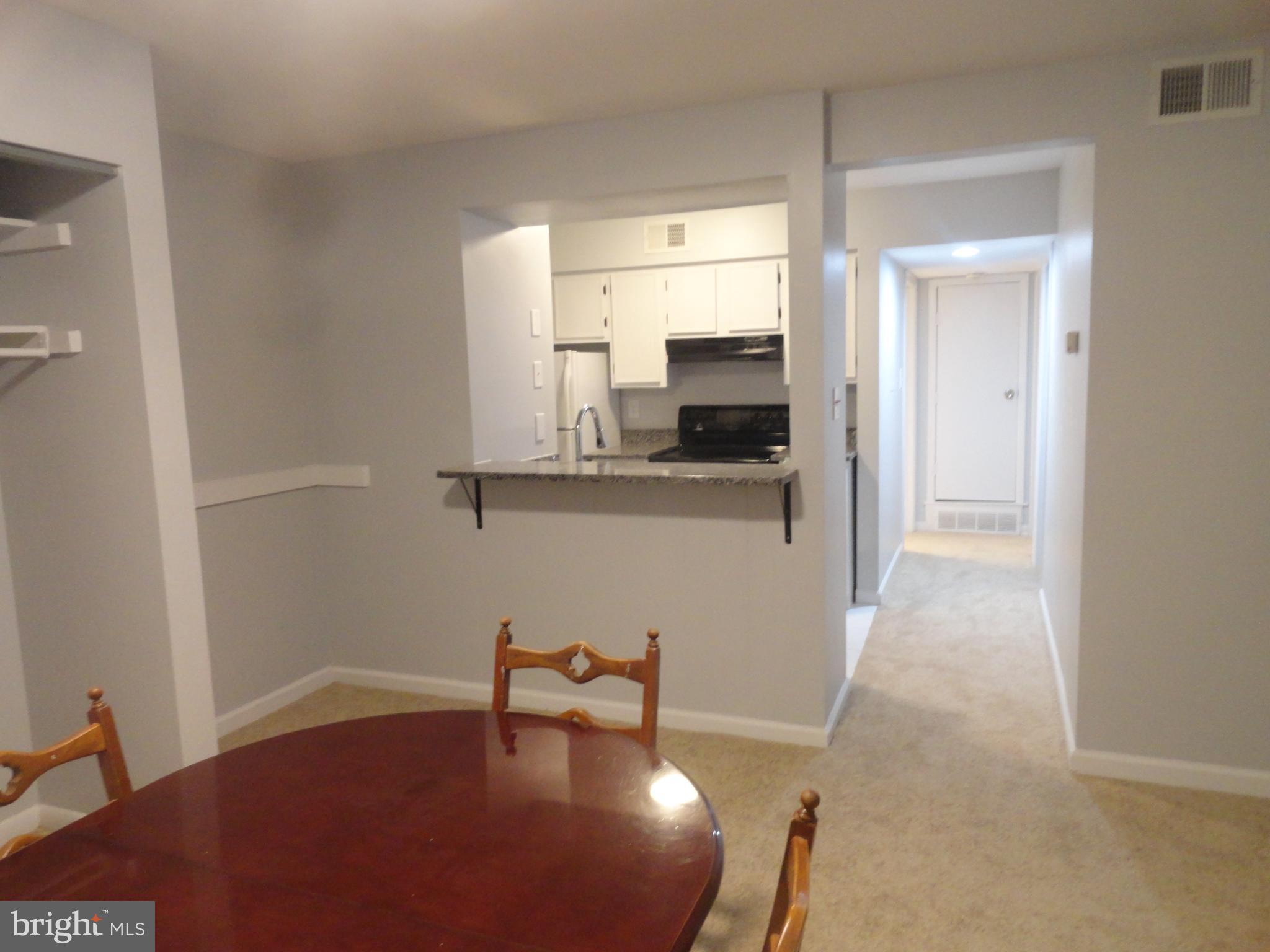5804 Royal Ridge Drive, Unit K Springfield, VA 22152 - Photo 6 of 33 dining room and kitchen