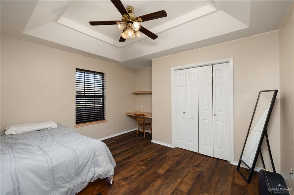 2210 Morning Lane Mission, TX 78572 - Photo 13 of 20 a bedroom with a bed and a window