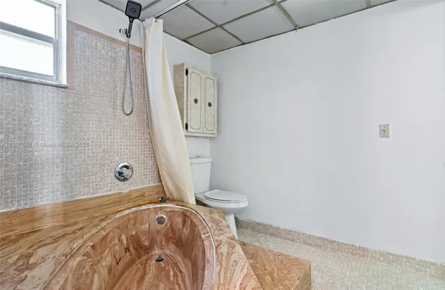 a bathroom with a sink and a shower