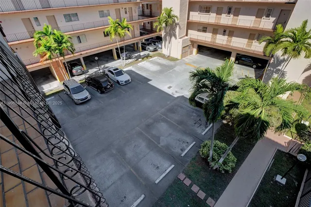 a view of a glass door and an empty room