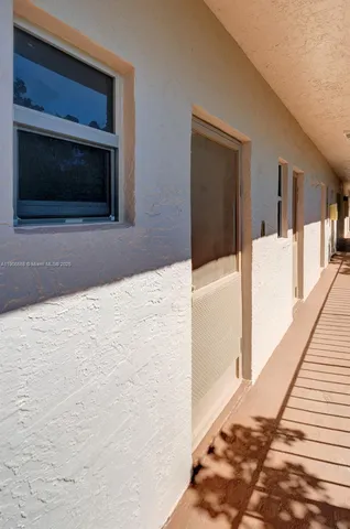 a view of swimming pool with outdoor seating