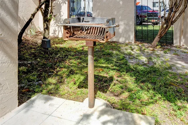 a view of swimming pool with a garden