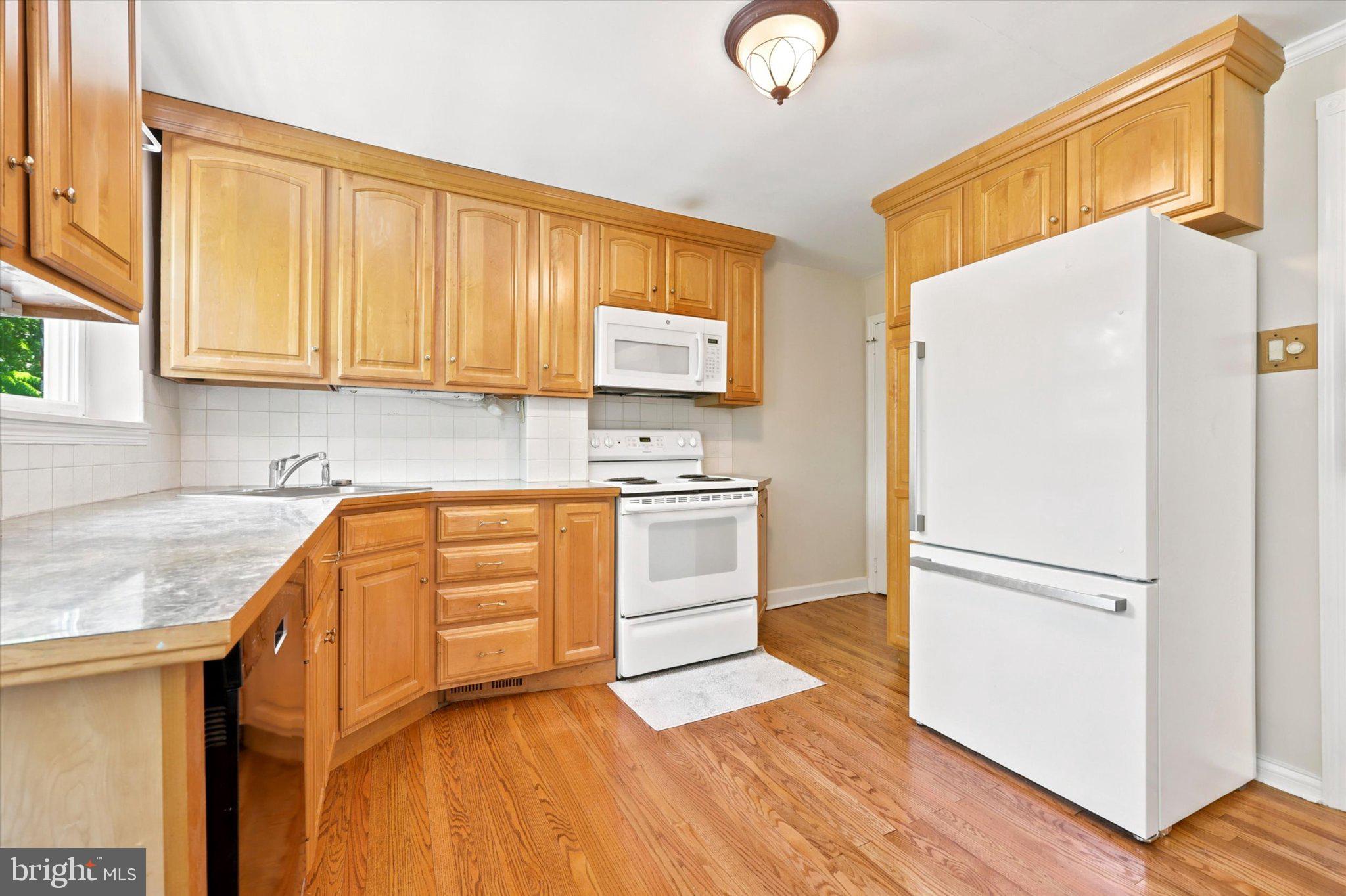107 Plant Avenue Wayne, PA 19087 - Photo 8 of 15 Bright and inviting kitchen space.