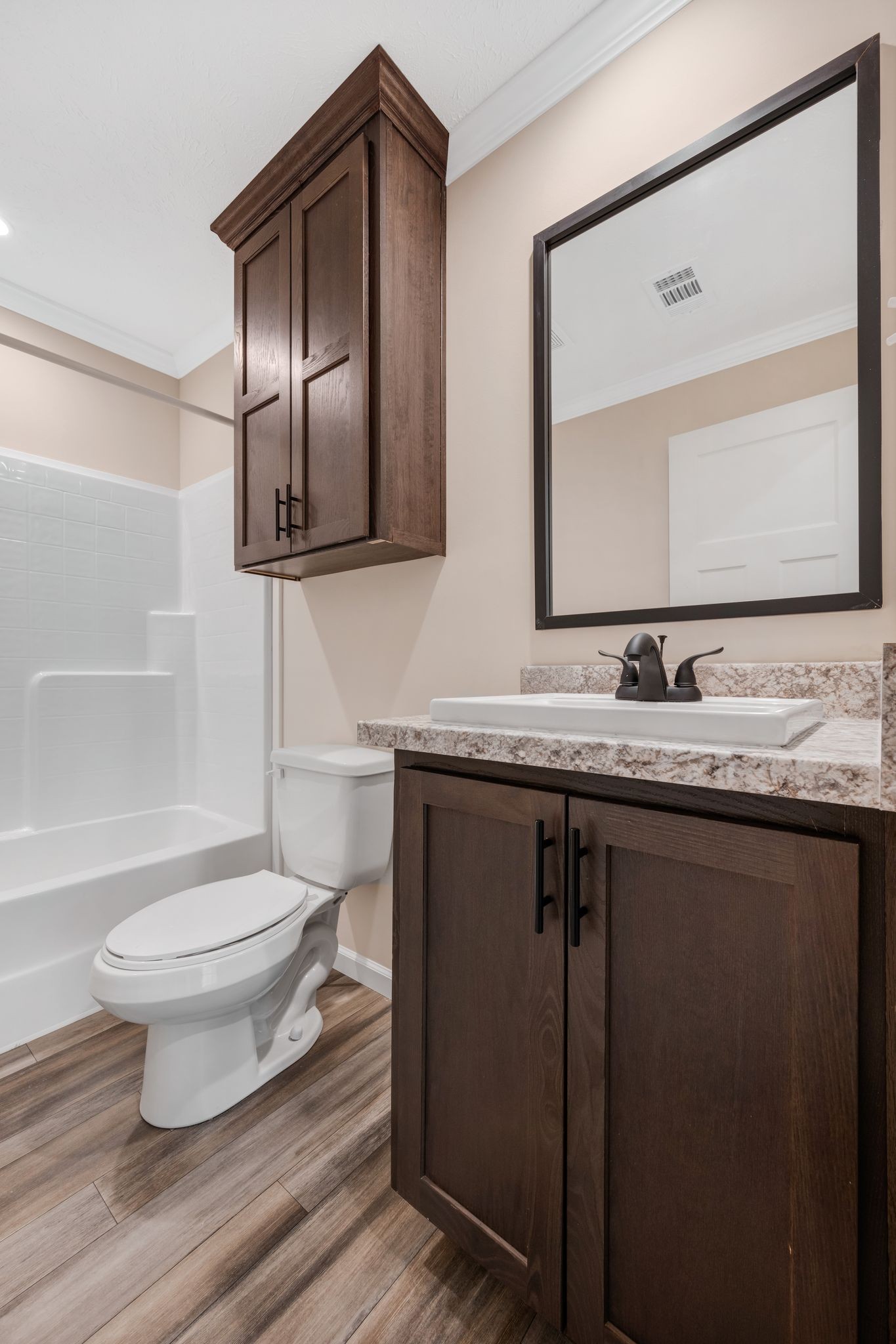 270 East Little Richland Road Waverly, TN 37185 - Photo 33 of 35 a bathroom with a granite countertop toilet sink and mirror