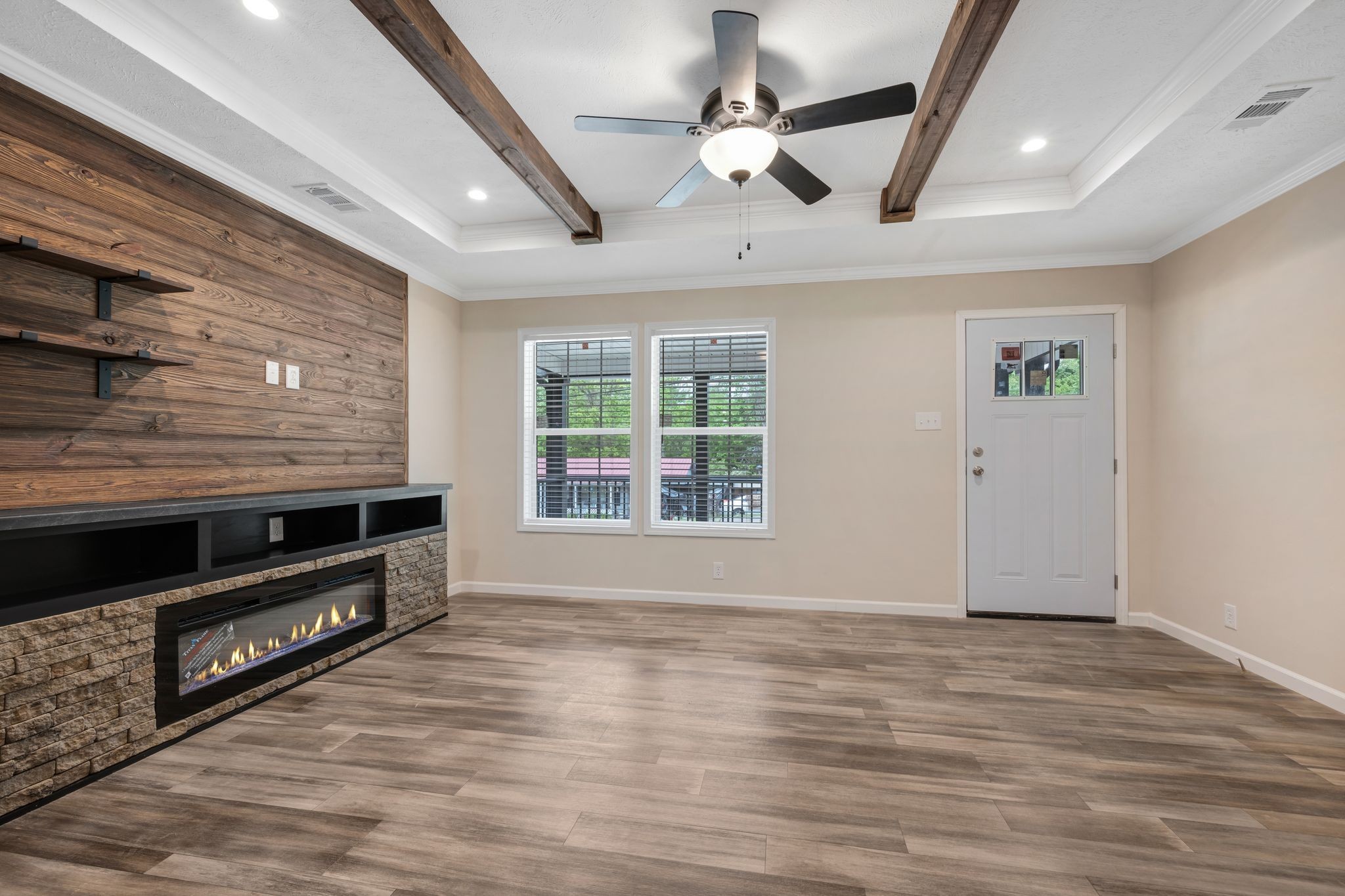 270 East Little Richland Road Waverly, TN 37185 - Photo 9 of 35 wooden floor in an empty room with a fireplace