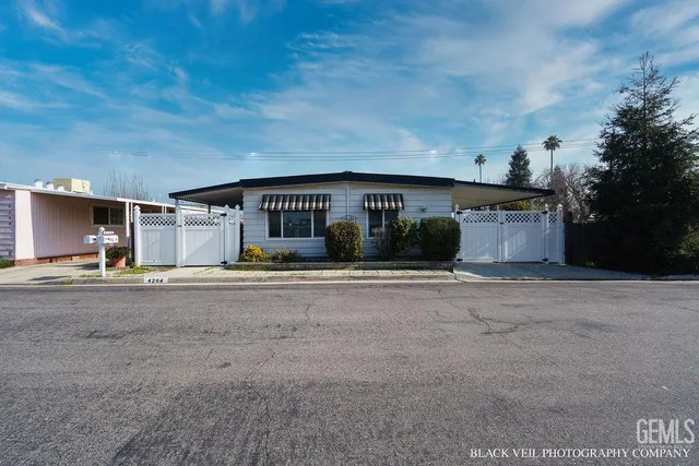 a front view of a house with a garage
