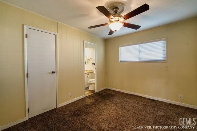 a view of a big room with carpet