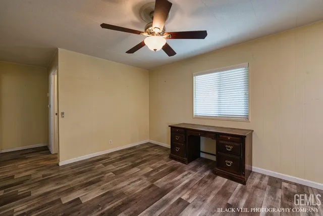 a room with a bed and a window