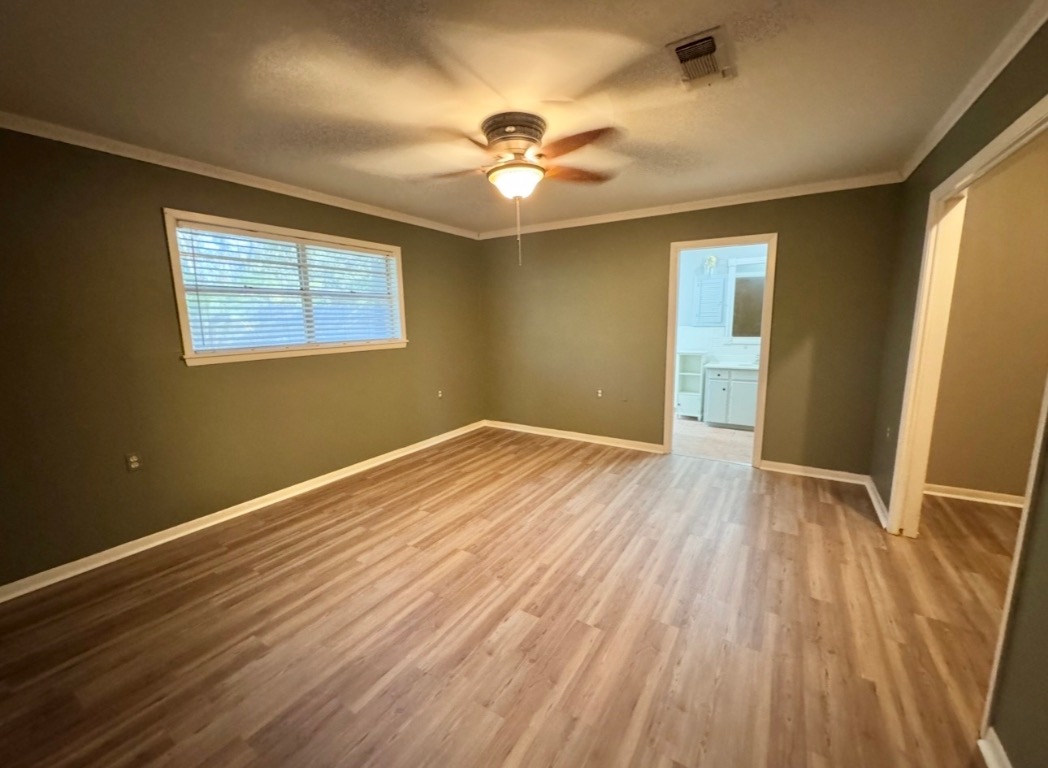 1225 Lake Terrace Drive Elgin, TX 78621 - Photo 14 of 28 a view of empty room with wooden floor