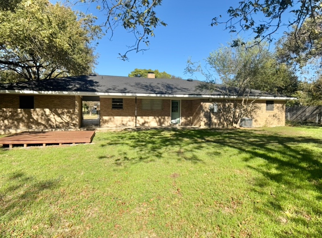 1225 Lake Terrace Drive Elgin, TX 78621 - Photo 25 of 28 a view of swimming pool with a garden