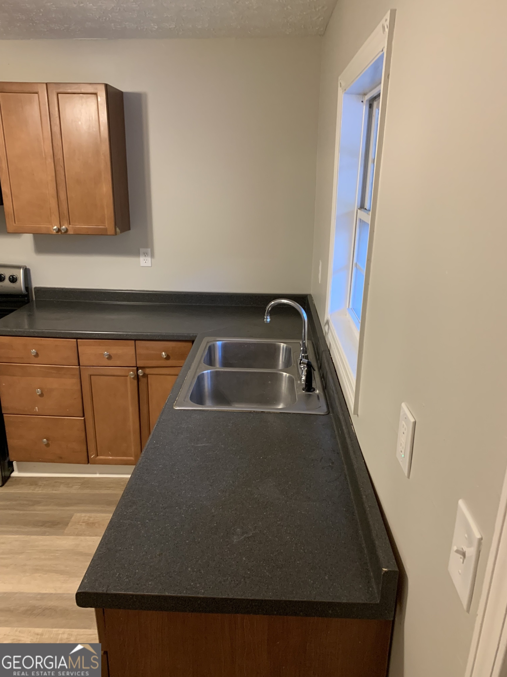 7181 Puckett Street Southwest Covington, GA 30014 - Photo 11 of 18 a view of front door