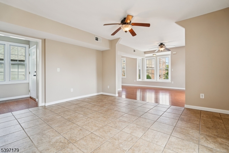 141 Walnut Street, Unit 2 Montclair, NJ 07042 - Photo 6 of 23 a view of an empty room with a window