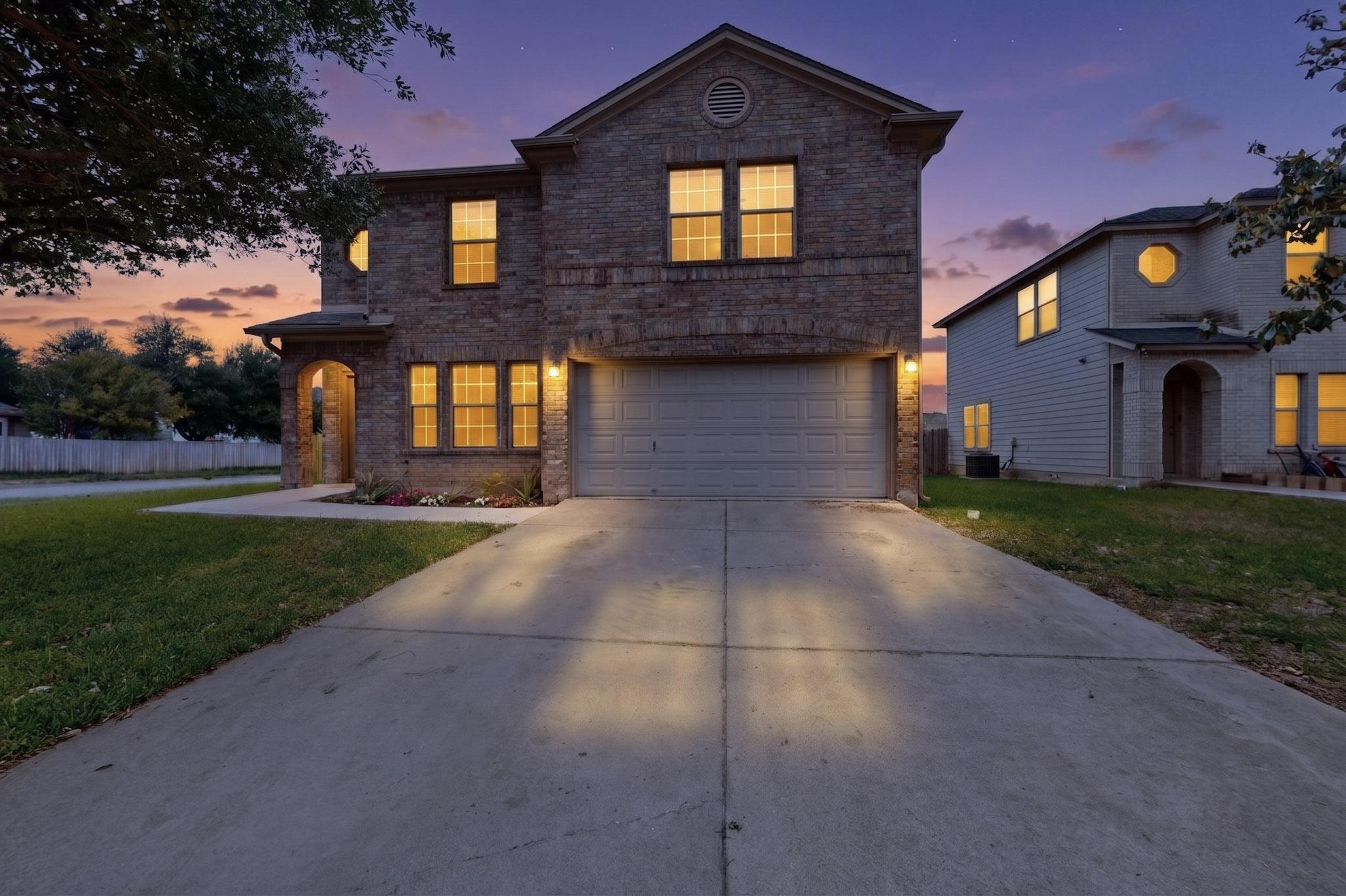 1200 Apollo Circle Round Rock, TX 78664 - Photo 1 of 45 a front view of a house with garden