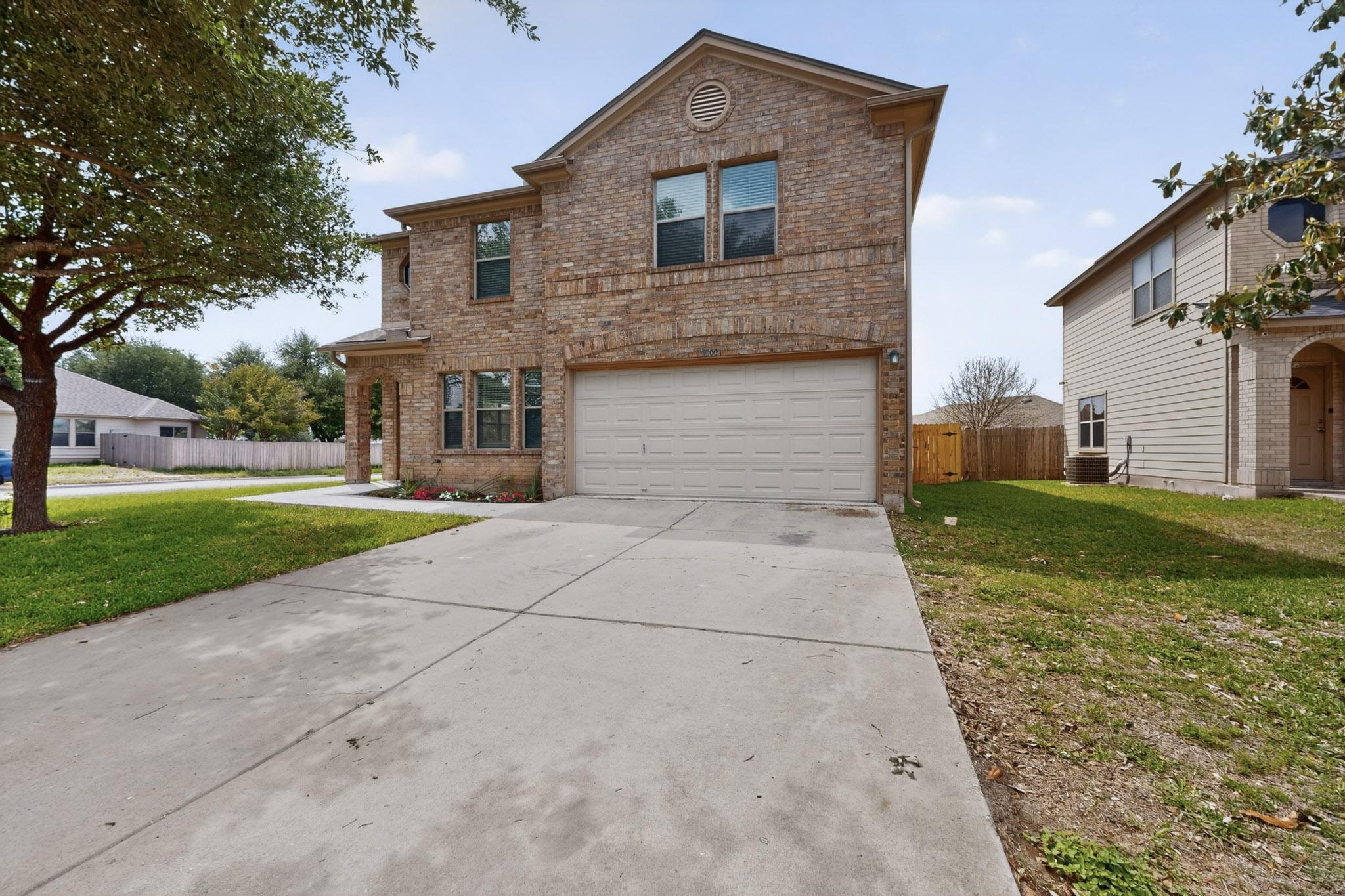 1200 Apollo Circle Round Rock, TX 78664 - Photo 2 of 45 a front view of house with yard