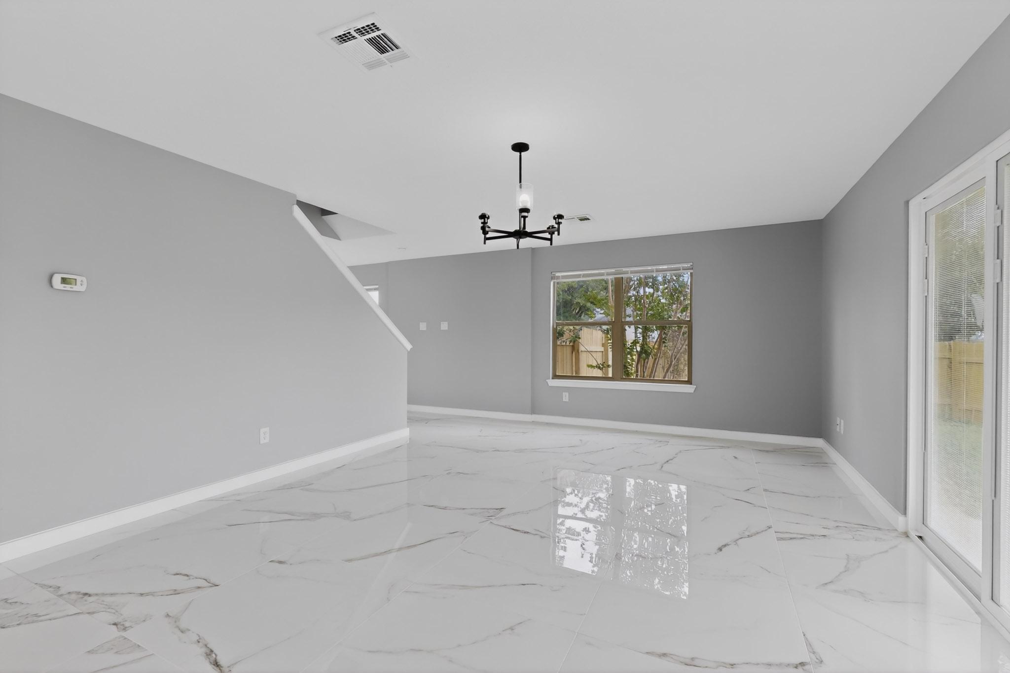 1200 Apollo Circle Round Rock, TX 78664 - Photo 22 of 45 wooden floor in an empty room with a window