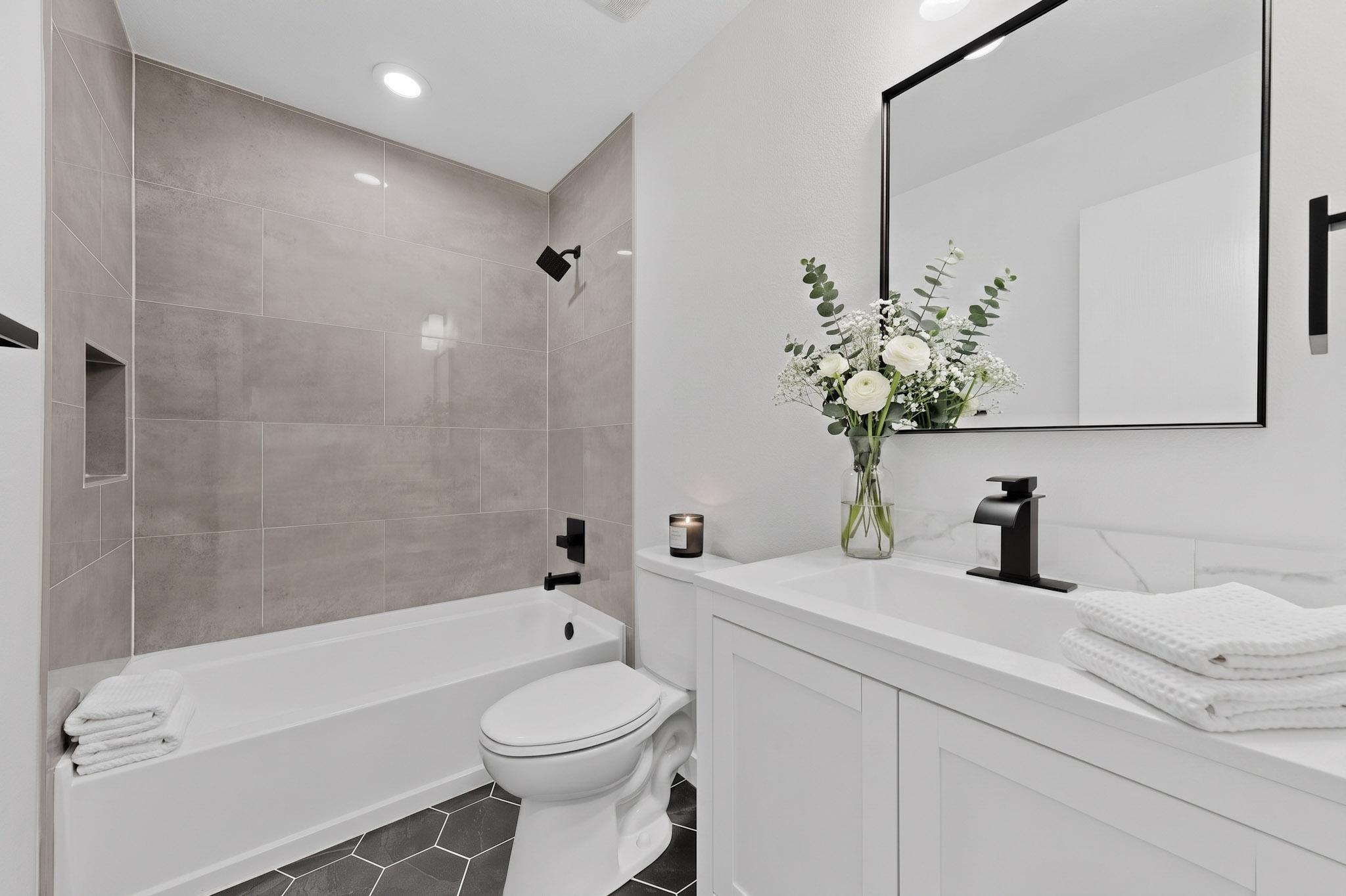 1200 Apollo Circle Round Rock, TX 78664 - Photo 37 of 45 a bathroom with a sink a toilet and shower