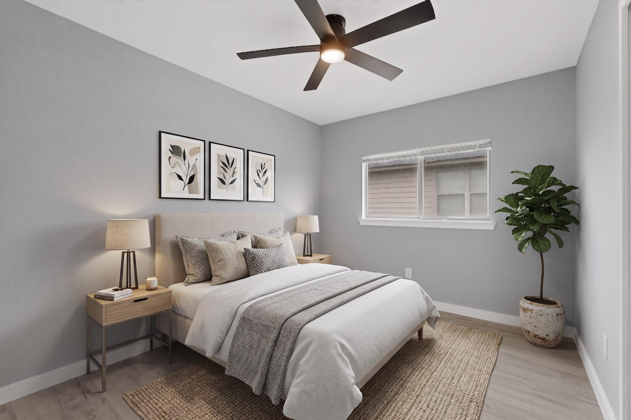 1200 Apollo Circle Round Rock, TX 78664 - Photo 40 of 45 a bedroom with bed and a potted plant
