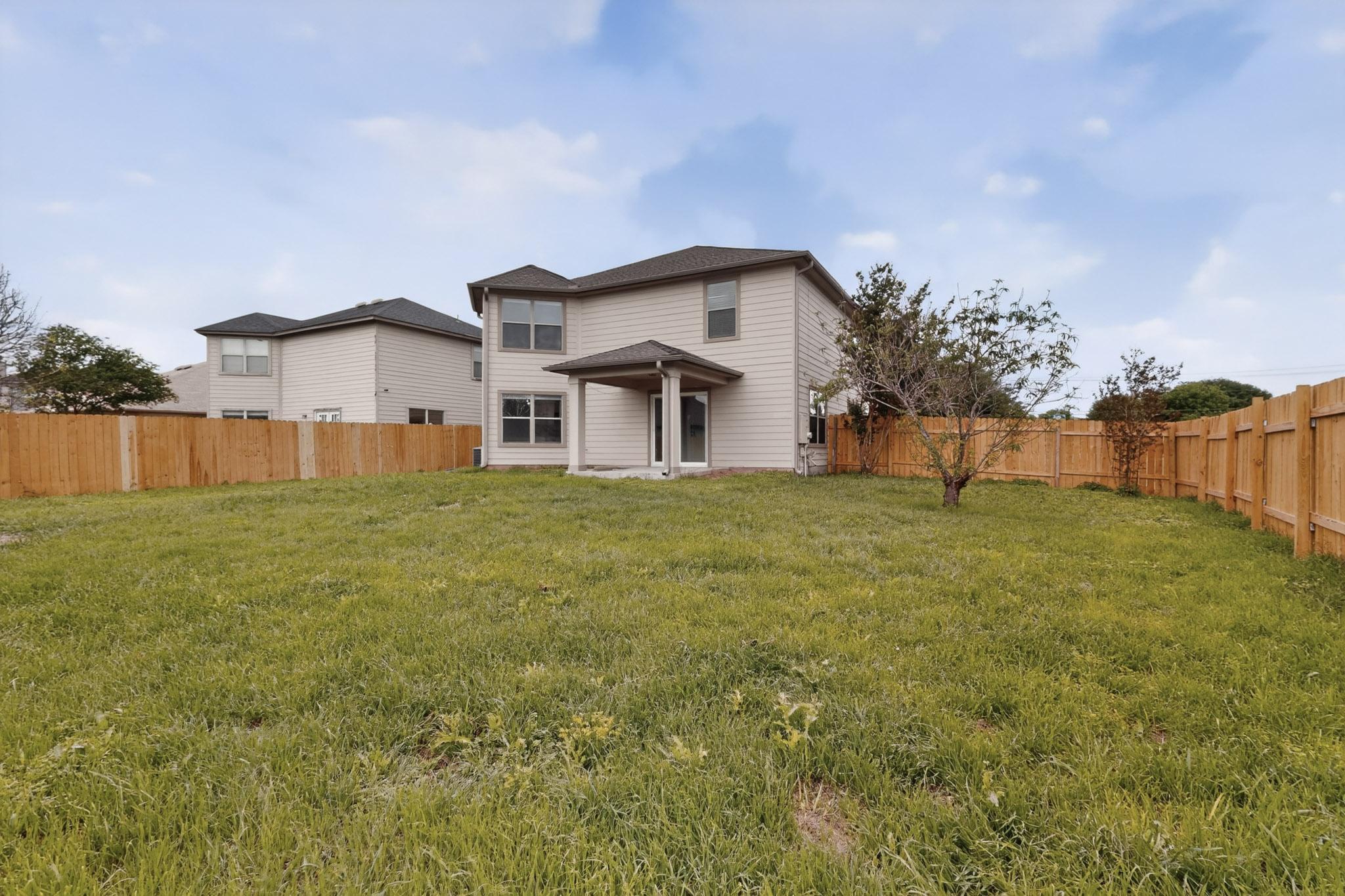 1200 Apollo Circle Round Rock, TX 78664 - Photo 45 of 45 a view of a house with a yard