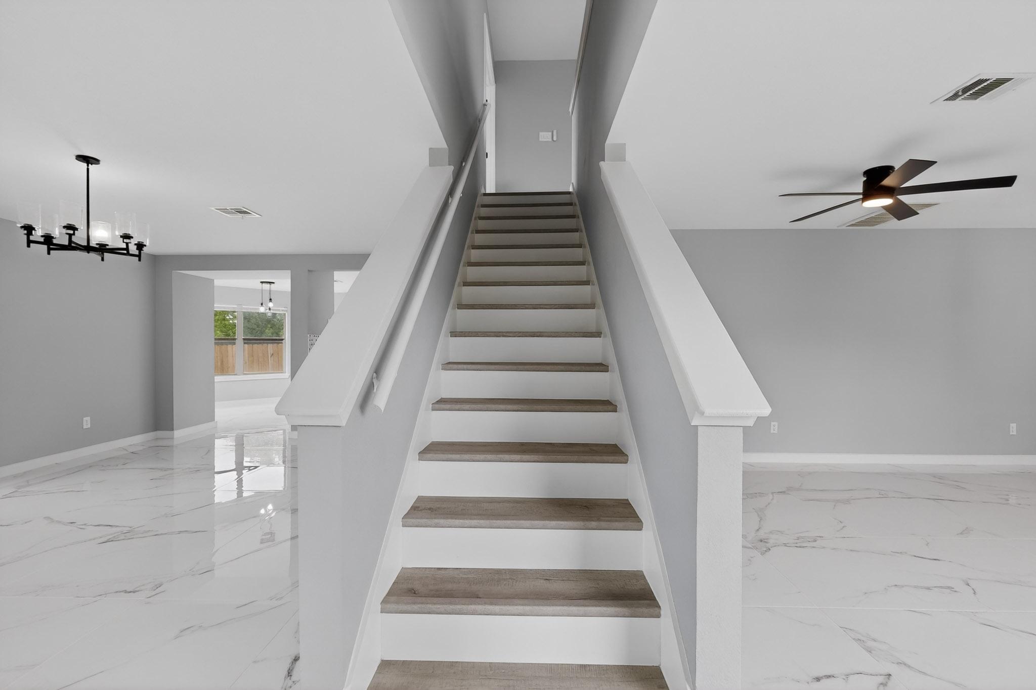 1200 Apollo Circle Round Rock, TX 78664 - Photo 5 of 45 a view of staircase with white walls