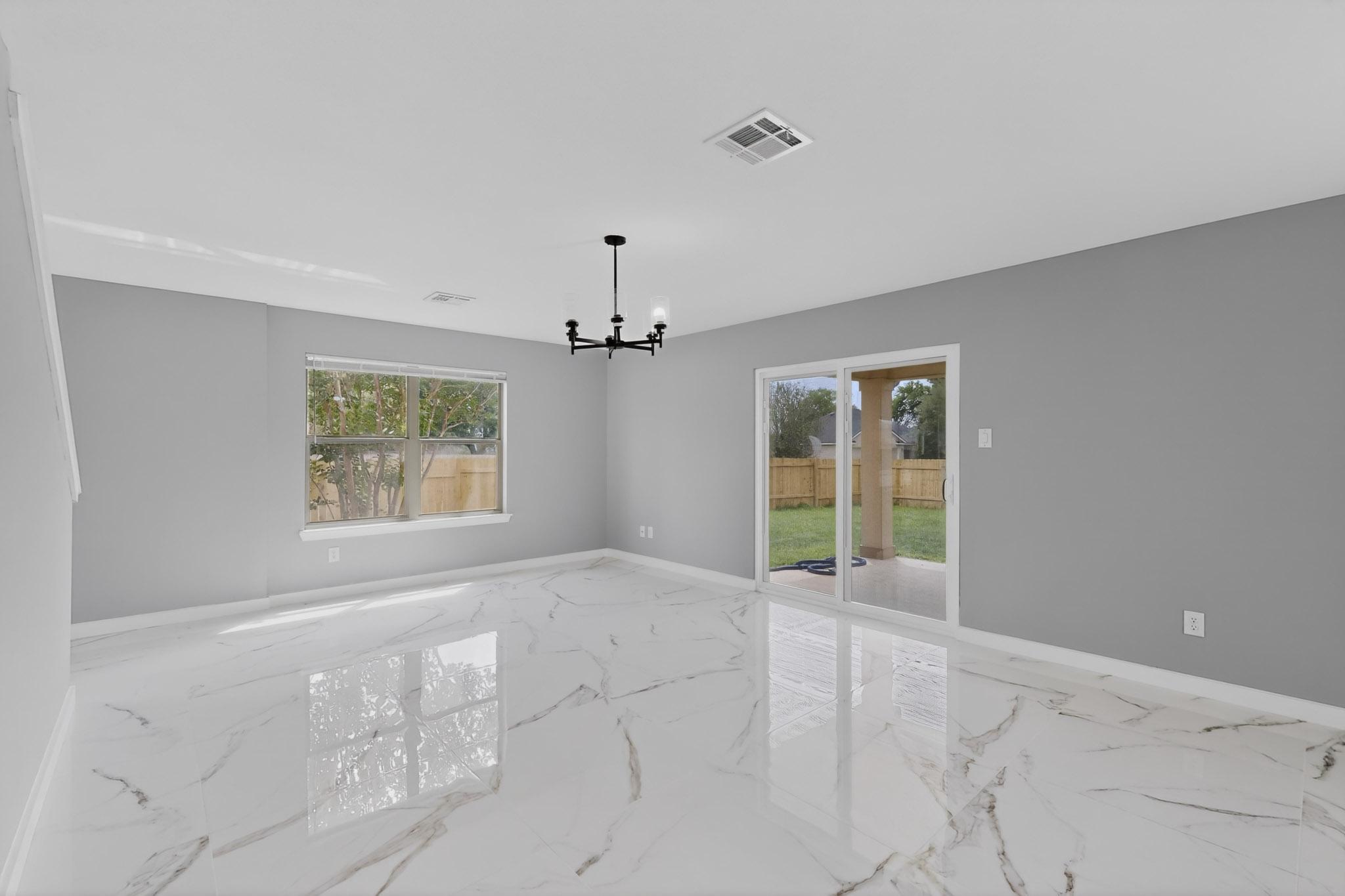 1200 Apollo Circle Round Rock, TX 78664 - Photo 10 of 45 a view of an empty room with a window