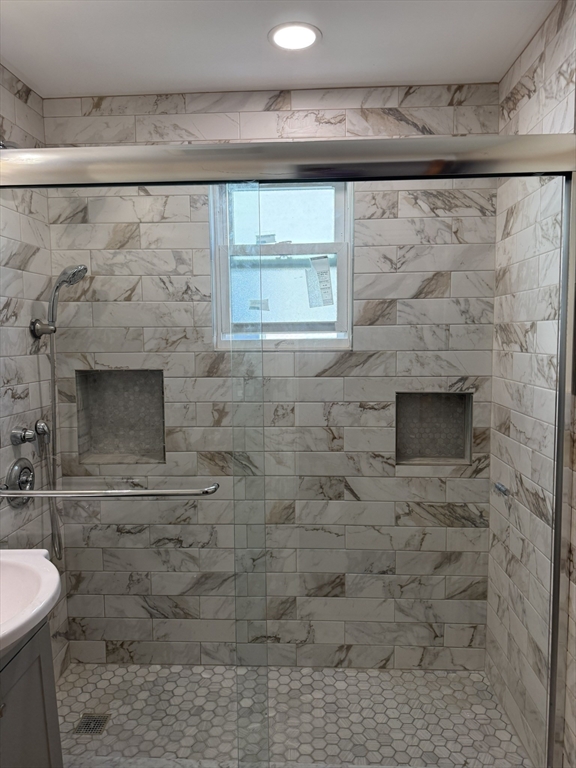 4 Dever Street, Unit 1 Boston, MA 02122 - Photo 11 of 22 a bathroom with a sink and a shower