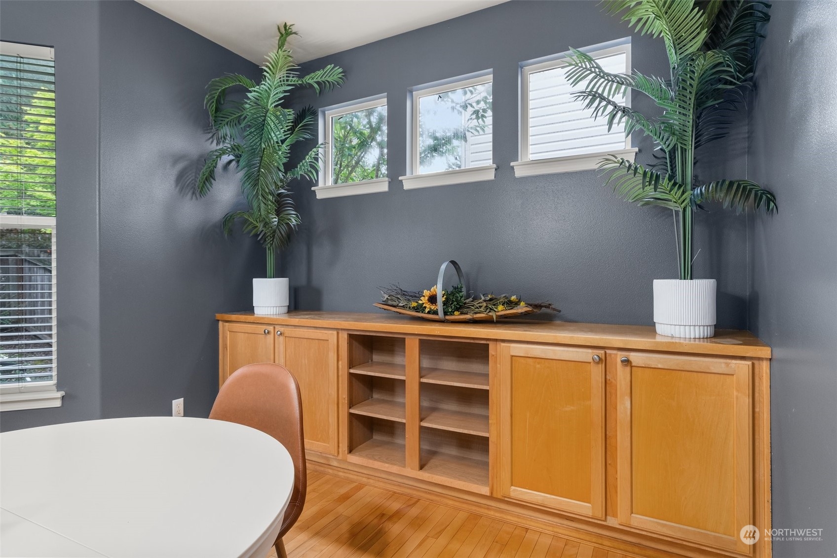 5049 Northeast 4th Place Renton, WA 98059 - Photo 16 of 39 a bed room with a bed and a potted plant