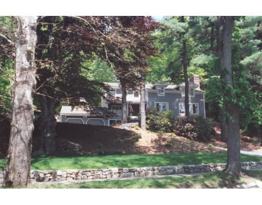 333 Lexington Road Concord, MA 01742 - Photo 1 of 1 a view of a yard in front of a house with a tree