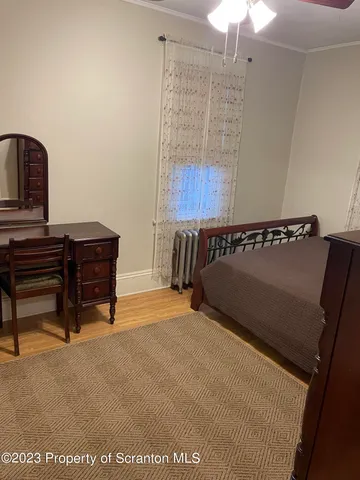 a view of a room with a window