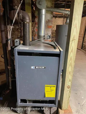 a view of a door with wooden walls