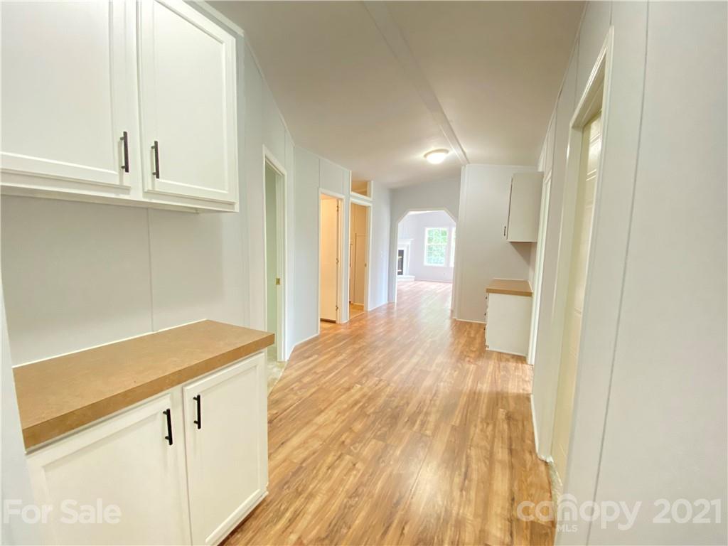7210 Medlin Road Monroe, NC 28112 - Photo 18 of 30 a bathroom with a sink and a mirror