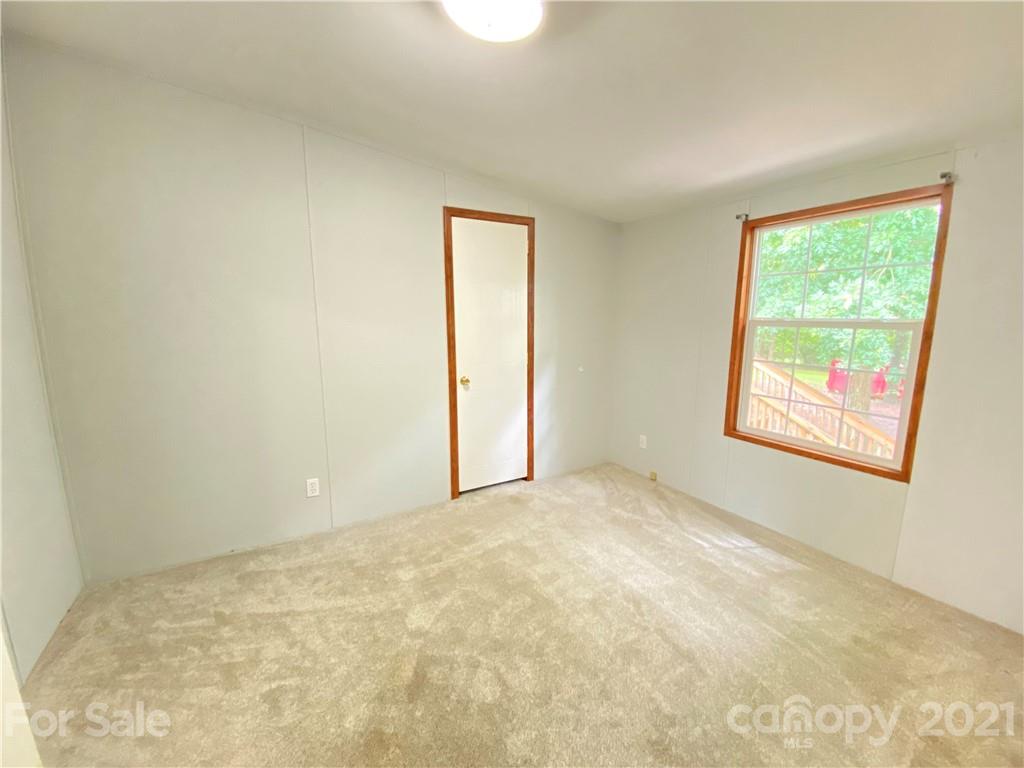 7210 Medlin Road Monroe, NC 28112 - Photo 20 of 30 an empty room with windows