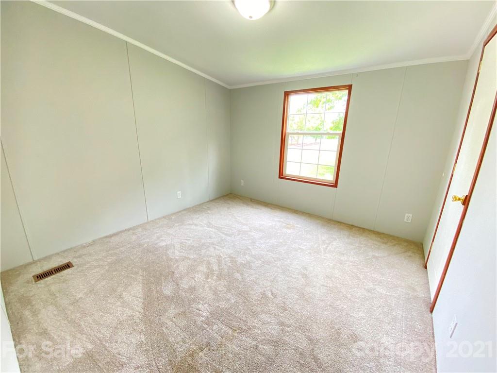 7210 Medlin Road Monroe, NC 28112 - Photo 22 of 30 an empty room with a window
