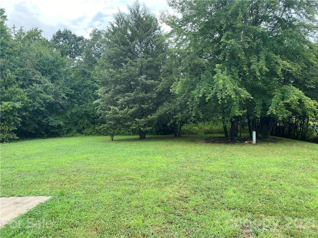 7210 Medlin Road Monroe, NC 28112 - Photo 5 of 30 a view of a field with a trees