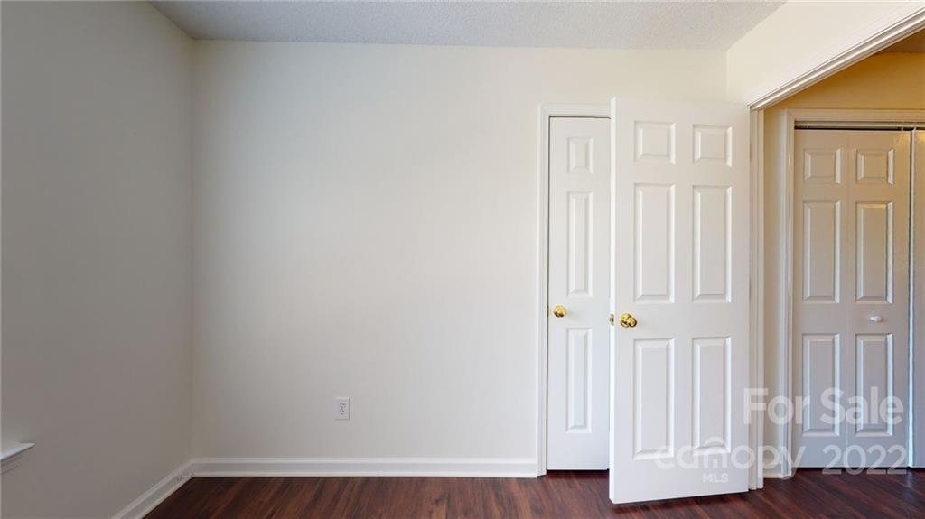 8821 Cameron Spring Road Charlotte, NC 28214 - Photo 23 of 40 a view of a small space with wooden floor