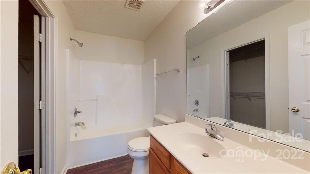 8821 Cameron Spring Road Charlotte, NC 28214 - Photo 30 of 40 a bathroom with a sink toilet and shower