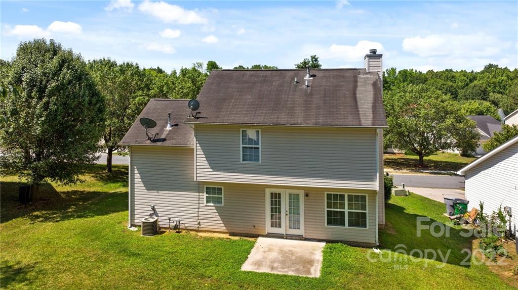8821 Cameron Spring Road Charlotte, NC 28214 - Photo 36 of 40 a aerial view of a house with a yard