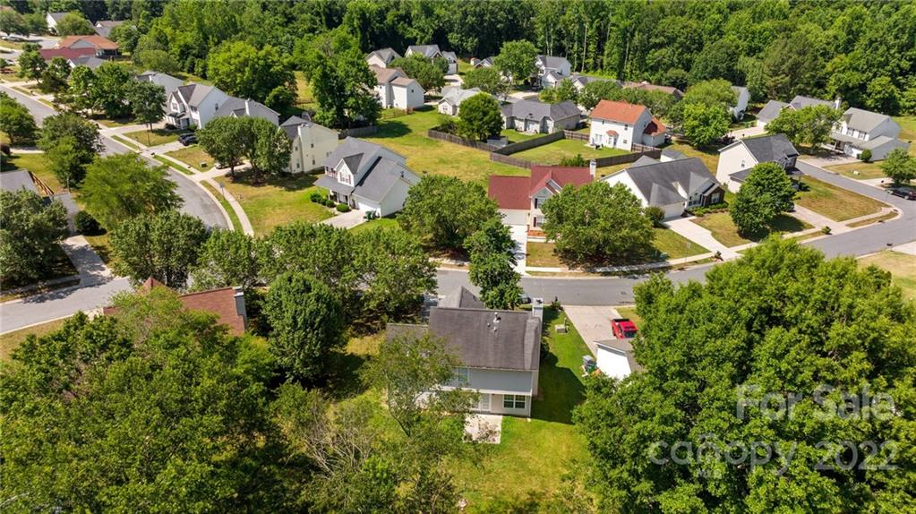 8821 Cameron Spring Road Charlotte, NC 28214 - Photo 40 of 40 an aerial view of residential house with outdoor space and trees all around