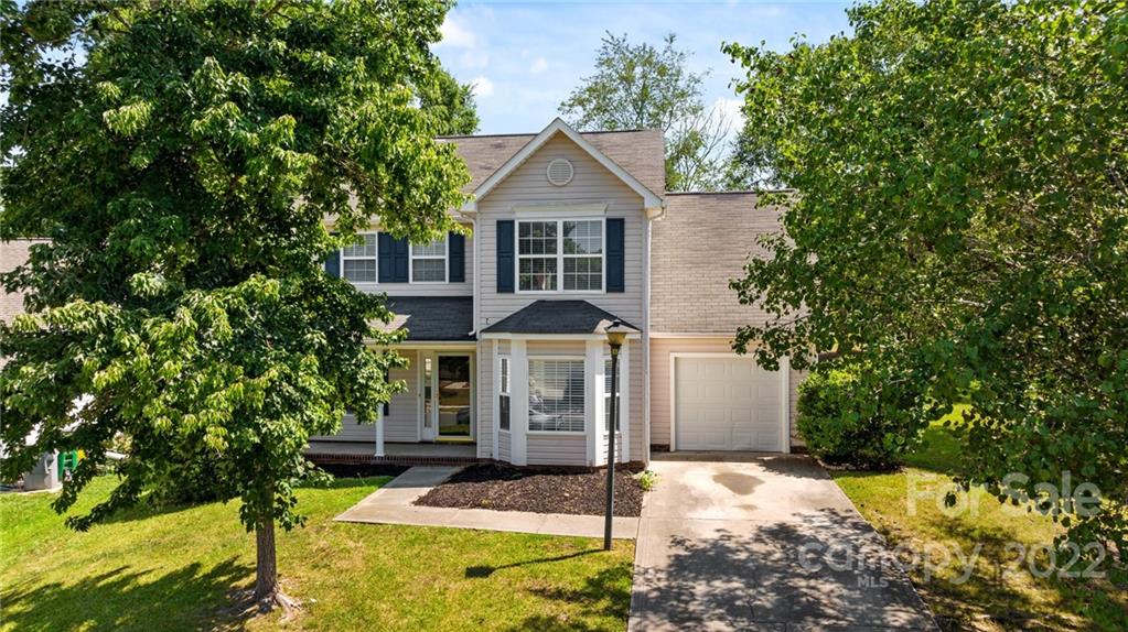 8821 Cameron Spring Road Charlotte, NC 28214 - Photo 4 of 40 front view of a house with a yard