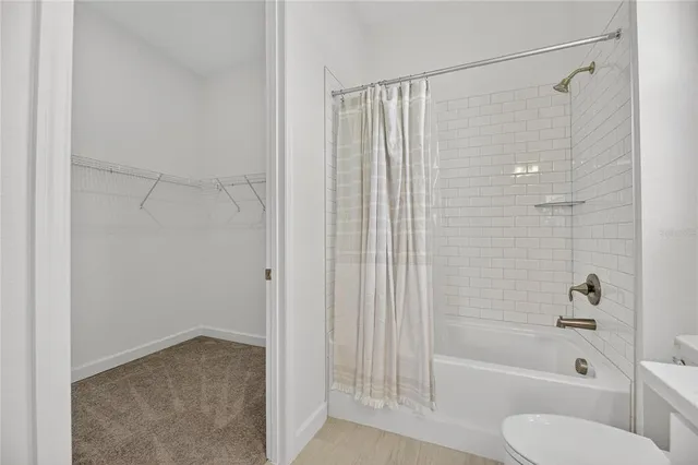 a kitchen with a table and chairs in it