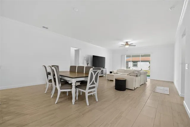 a bed room with a bed and a chandelier