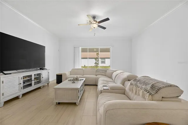 a white bath tub sitting next to a white sink