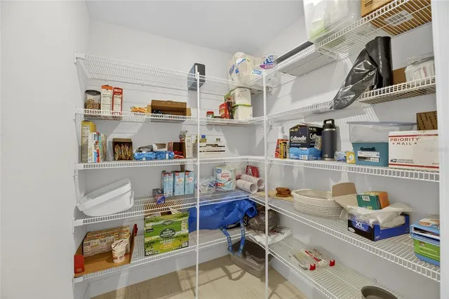 a bathroom with a toilet sink and shower