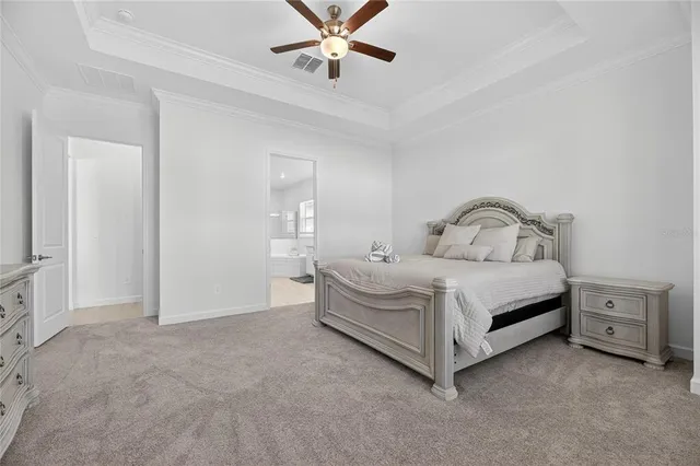 a view of a house with backyard and garden