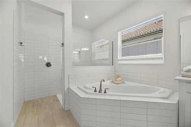 a view of an house with backyard space and garden