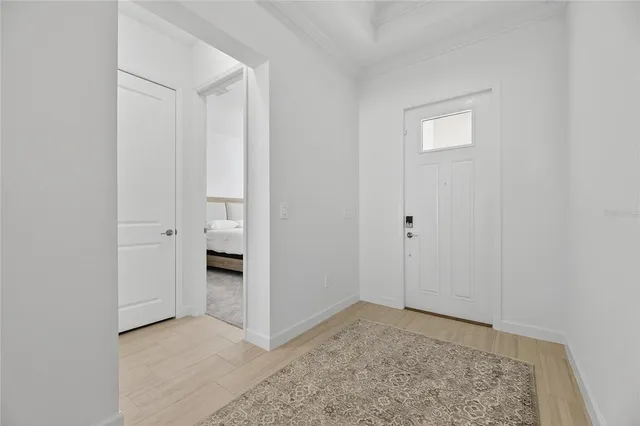 a bedroom with a bed and cabinets