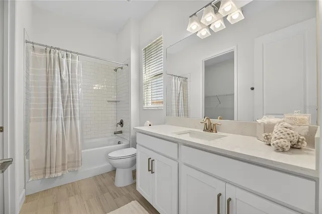 a view of kitchen with a sink and a chair
